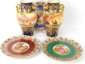 Two Noritake twin-handled baluster vases with hand painted desert scenes, blue ground and gilt