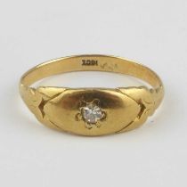 An 18ct gold signet ring with star set tiny diamond, size Q, approx. 2.8g.
