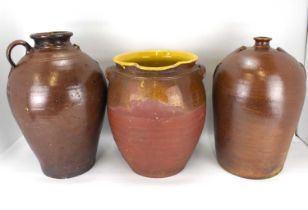 Three 19th century and later salt glazed storage pots, comprising two of amphora shape, the other