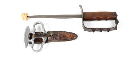 An early 20th century US trench fighting combination knuckle duster and tri-blade dagger, stamped to
