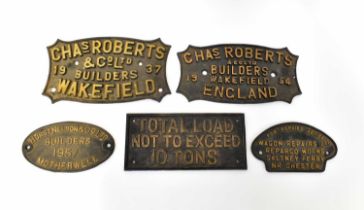 Five vintage cast iron wall plaques comprising, two for 'Charles Roberts & Co Ltd Builders,