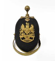 A British pre-WWI Royal Artillery blue cloth officers' helmet. Condition Report: There is a small