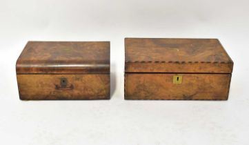 Two Victorian walnut writing slopes, both with brass inlay and fitted interiors (2).