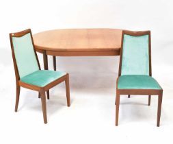 G-PLAN; a teak extending dining table with one integral leaf, on turned tapering legs, 74 x 166 x