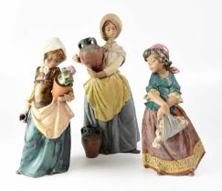 LLADRÓ; three matte finish figures of girls, comprising a girl carrying an amphora, a girl