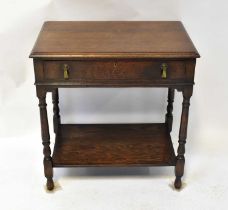 WALKER & HALL; a 1930s oak table canteen of cutlery for twelve place settings, the drawers with