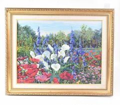 JOHN POWELL; a limited edition coloured print on canvas, lilies, poppies and other flowers in a