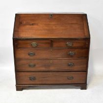 A 19th century mahogany bureau, the fall front enclosing basic fitted interior, on a base of two