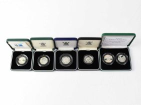 Four United Kingdom silver proof fifty pence (50p) coins, 150 Year of Public Libraries, 1992-1993,