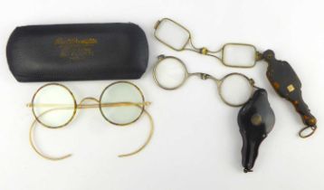 Two pairs of 19th century lorgnettes, including one with tortoiseshell and gold panel, bearing