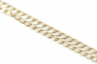 A 9ct yellow gold flat curb link chain, length 51.4cm, approx. 16.4g.