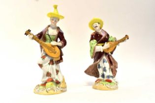 DRESDEN; a matched pair of 19th century figures of Malabar musicians, after the models by F. E.