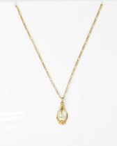 A 9ct gold Figaro link necklace, length 40cm, with faux pearl pendant, approx. 2.6g.