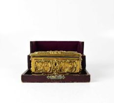A Victorian gilt brass jewellery casket embossed to lid with image of Queen Victoria and images of