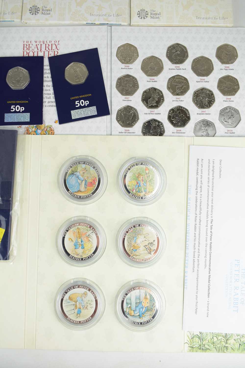 BEATRIX POTTER; various Peter Rabbit inspired commemorative 50p coin collectors' packs, to include - Image 2 of 4