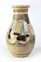A Japanese baluster-form vase decorated with ducks amongst foliage, height 24cm.