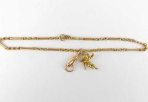 A 15ct gold bar and chain link bracelet, length 36cm, together with a 9ct gold swivel clasp and