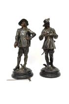 A pair of bronzed spelter figures of Cavaliers, converted to table lamps, height 46cm (both swords
