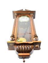 GUSTAV BECKER; a walnut cased twin-weight Vienna wall clock, striking on a gong, stamped to