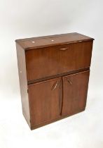 A mid-20th century walnut veneered cocktail cabinet with drop-down front and cupboard doors, 98 x 73