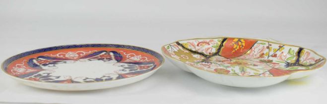 An early 19th century Derby shell-shaped dish decorated in the Imari palette, lozenge foot rim