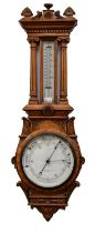 G. CARTWRIGHT & SON, PRESTON; a large late 19th/early 20th century oak cased aneroid barometer/