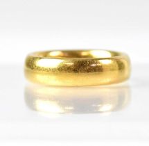 A 22ct gold wedding band, size P1/2, approx. 14.7g.