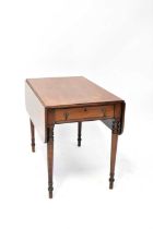 A 19th century mahogany Pembroke table with single frieze drawer, on turned and reeded tapering