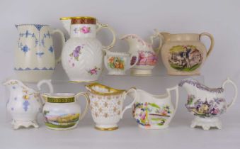 Various 18th, 19th century and later pottery and porcelain jugs, to include a Staffordshire jug with