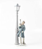 LLADRÓ; a figure 'Lamplighter, 05205', height 47cm, in original box. Condition Report: - The