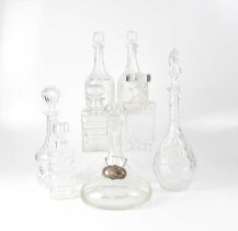 A small group of decanters, including a contemporary ship's decanter with blank hallmarked silver
