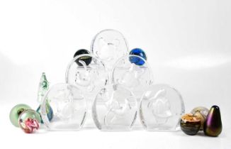 DISNEY; a collection of seven Disney character glass paperweights, characters to include Mickey