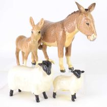 BESWICK; four gloss animal figures, comprising a donkey, foal, ram and lamb (4).