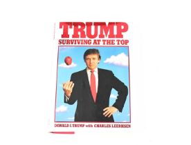 DONALD TRUMP; 'Trump Surviving at the Top', signed and dedicated to inner page, 'To Tim & John