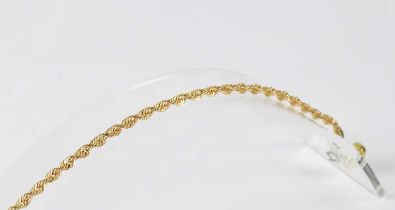 A 9ct gold bracelet with magnetic clasp, length 19cm, approx.2.5g.