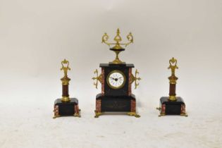 A Victorian marble inlaid slate clock garniture, with applied metal mounts, on lion paw feet, height