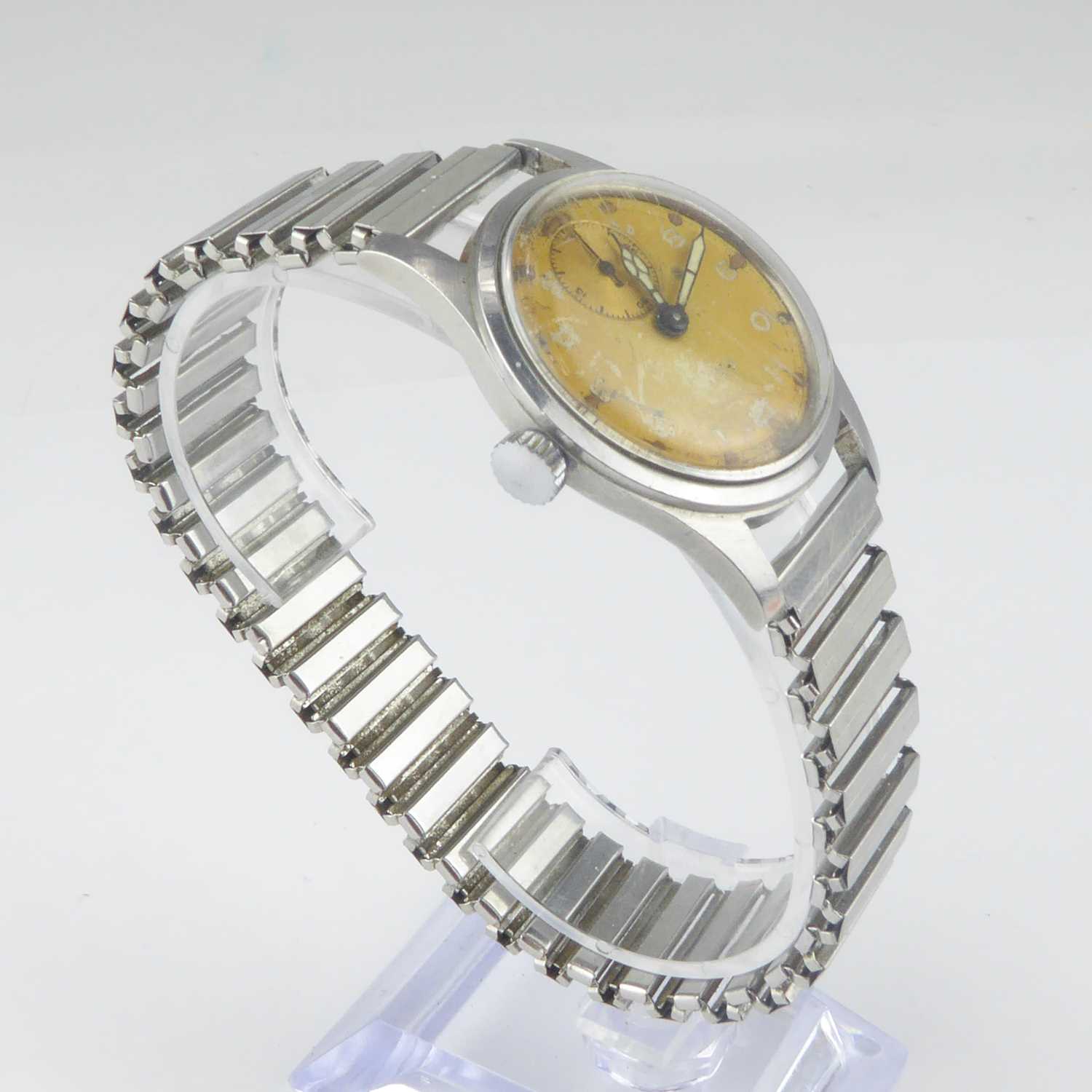 A gentlemen's vintage stainless steel crown wind wristwatch, the champagne-coloured dial set with - Image 2 of 3