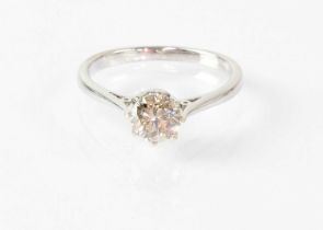 An 18ct white gold solitaire diamond ring, approx. 1ct, in a claw setting, stamped '18CT', size O