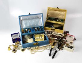 A good quantity of costume jewellery to include Trifari items, brooches, earrings, necklaces, all
