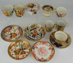 Thirteen items of late 18th and early 19th century Imari decorated teaware, cups, saucers and coffee