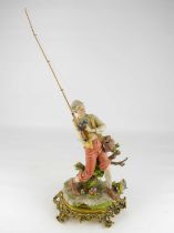 CAPODIMONTE; a large porcelain figure depicting a fisherman with his catch, on a gilt brass base,
