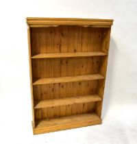 A rustic pine bookcase with three shelves, 145 x 100 x 22cm.