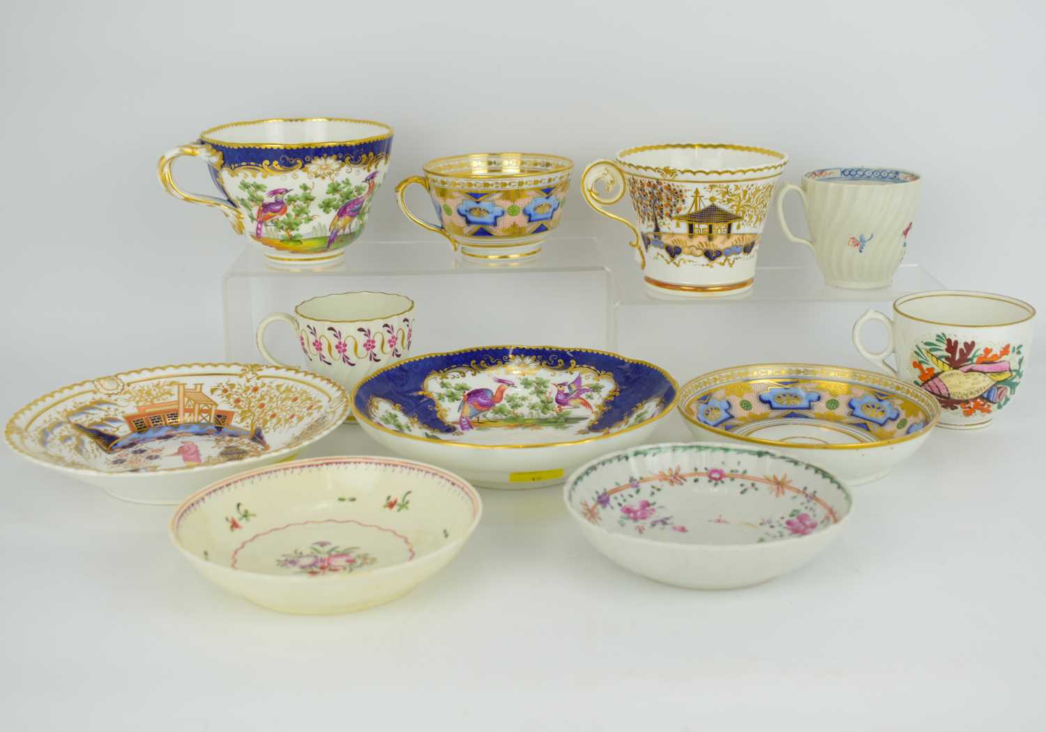 A collection of late 18th and 19th century porcelain teaware, to include a Herculaneum porcelain cup