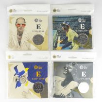 ROYAL MINT; four Elton John £5 coin presentation packs from the 'Treasures for Life' series, all