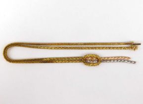 A 14K three-colour gold necklace, with white and rose gold drop under an oval buckle, continuing