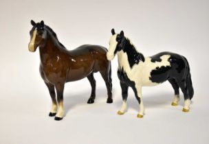 BESWICK; a brown glazed horse and a similar black and white example (2). Condition Report: