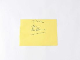 IAN FLEMING; a torn page from an autograph book with dedication, 'To John from Ian Fleming', 9.5 x