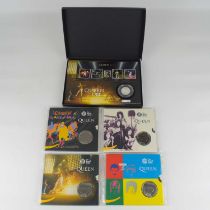 ROYAL MINT; four Queen £5 coin presentation packs from the 'Treasures for Life' series, all