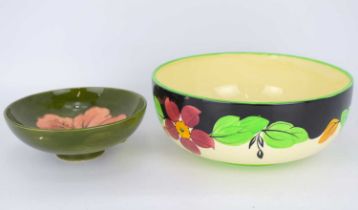 WALTER MOORCROFT; a mid-20th century green 'Hibiscus' pattern bowl, height 5cm, diameter 14cm,