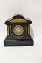 A Victorian slate mausoleum clock with applied brass decoration to the pediment, the brass and